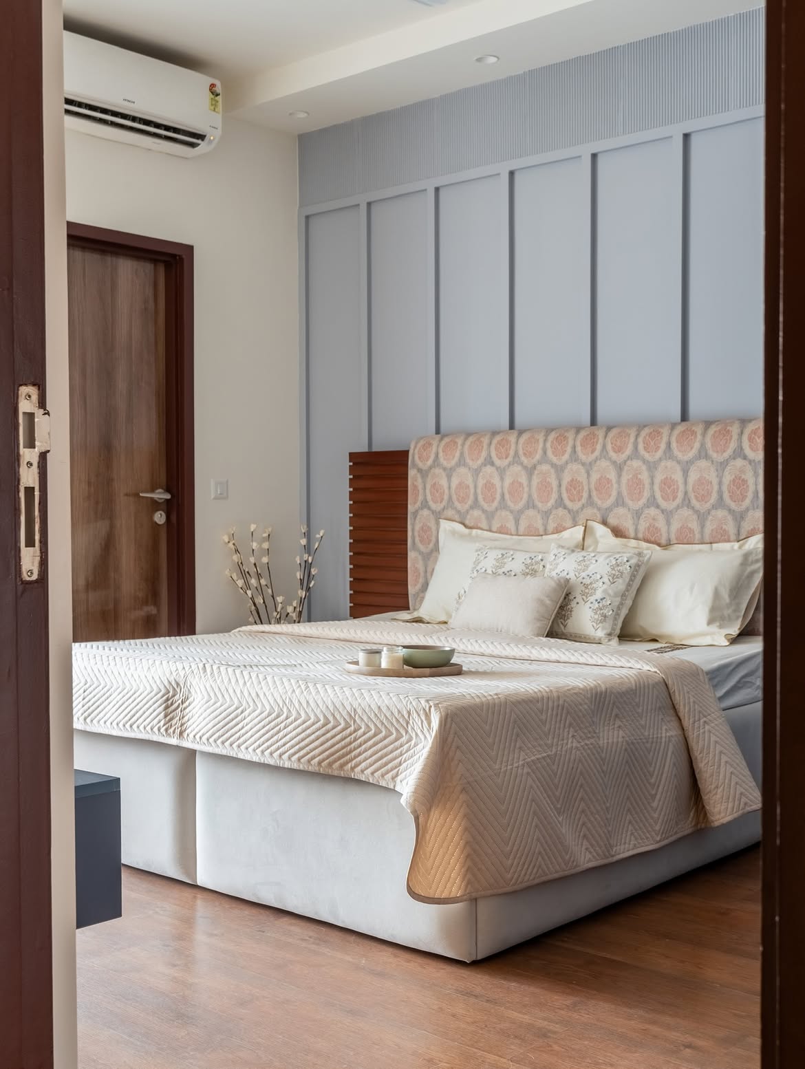 Interior designers DLF Garden City modern bedroom headboard design
