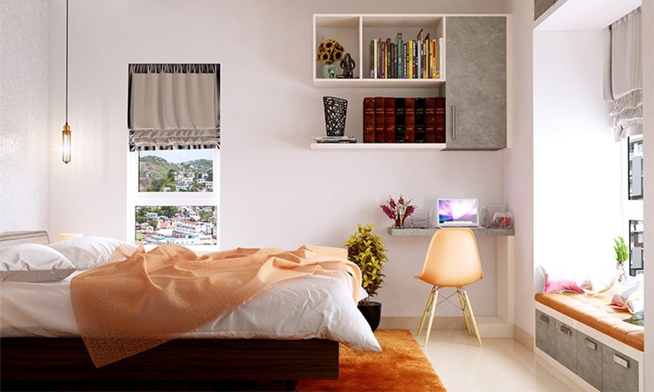 Floating shelf display wall above a bedroom headboard