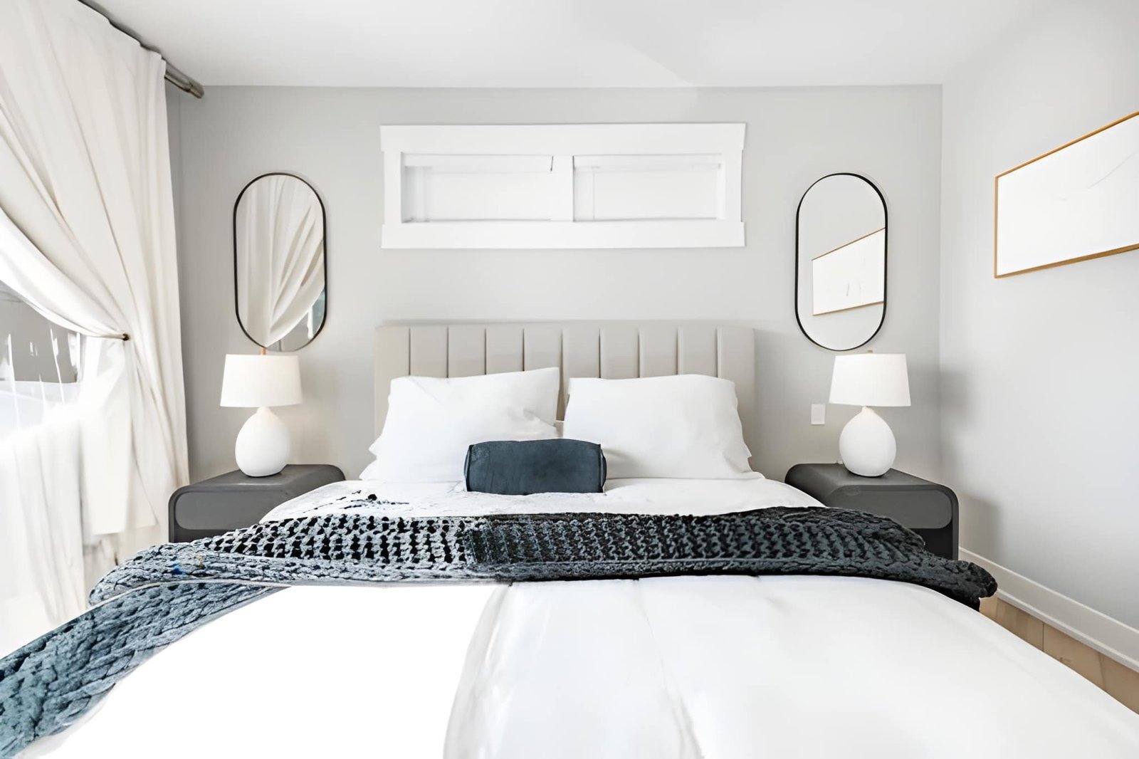 Mirror feature wall in a bedroom
