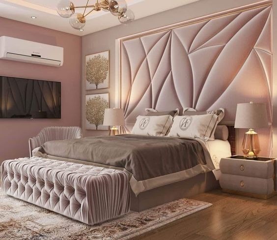 Upholstered or fabric panel headboard wall in a bedroom